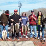 a family with their fresh catch