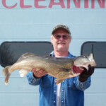 man holding a very large fish